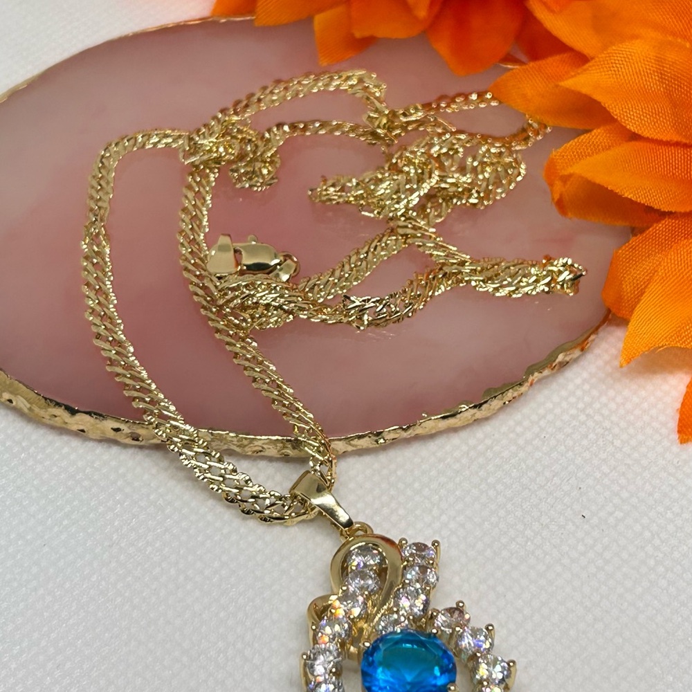 Elegant Gold Necklace with Blue Gemstone